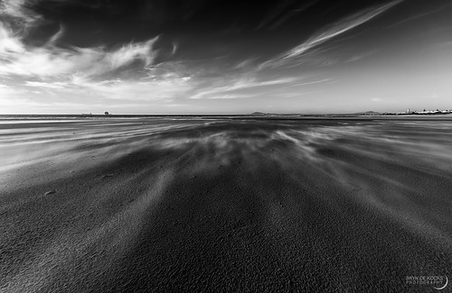 ocean sky blackandwhite beach clouds landscape southafrica town sand cape milnerton cirrus sigma1020mm lagoonbeach canon50d