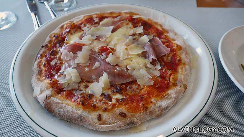 Pizza with ham and cheese toppings 
