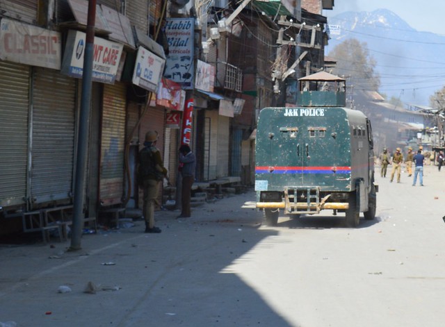 Jammu & Kashmir police’s armoured vehicle on its way to give cover to forces dispersing protestors.