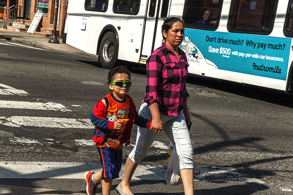 Mother and child crossing Washington Avenue on 5-19-16--Italian Market