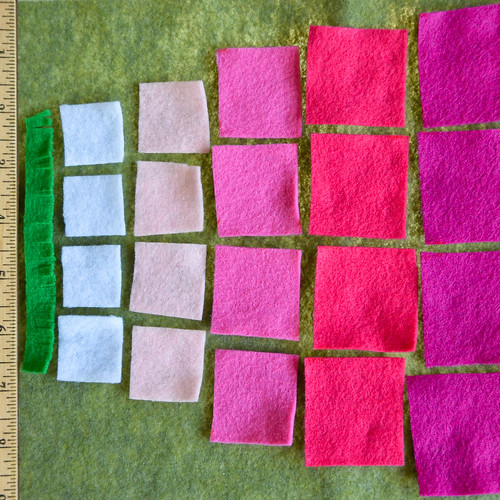 Step 1: Cut out squares, each color has equal sized squares (1", 1.25", 1.5", 1.75", 2")