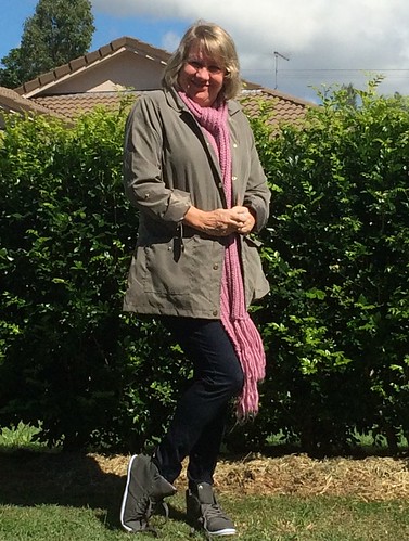 layers for a travel wardrobe featuring Millers khaki anorak and denim jeggings