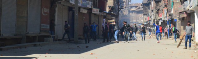 Agitating youths with/without wearing rags pelting stone on security forces near Lal Chowk.