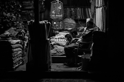 street city nepal portrait urban bw men shop night tv asia noiretblanc candid photojournalism documentary nb asie himalaya rue nuit himalayas ville urbain streetshot népal southasia subcontinent documentaire ilam photojournalisme photoreportage asiedusud blackandwhyte earthasia himalayasproject mafate69
