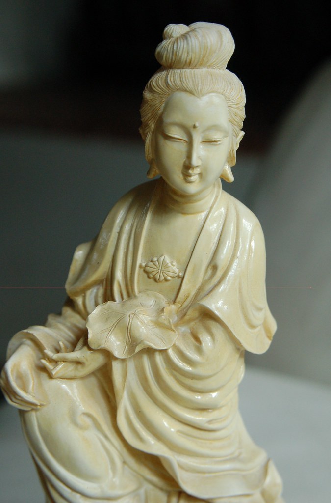 Quan Yin Goddess of Healing... drapery and lotus leaf