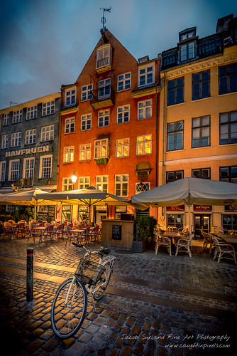 city lines bicycle clouds copenhagen denmark nyhavn harbor cafe closed cityscape fineart cobblestones oldhouse newport dk lamps bluehour ambience hdr highdynamicrange oldbuilding warmlight fineartphotography citybynight capitalregionofdenmark caughtinpixels jacobsurland