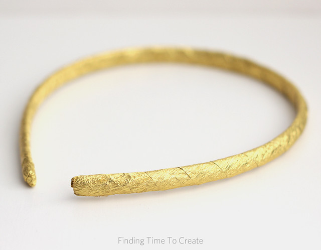 Headband wrapped with gold foil crepe paper