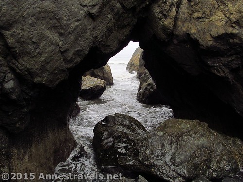 The tide running through the sea arch on Ruby Beach, Olympic National Park, Washington