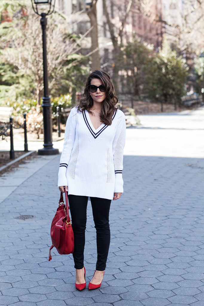 varsity sweater banana republic black skinny jeans white sweater red accents red chloe marcie bag red dvf bethany heels suede red heels nyc fashion blogger corporate catwalk spring look 