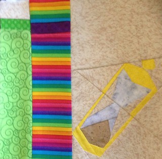 Pod block for Tammy.  Had to add a stripe on green book as I didn't have enough of the light green fabric.  Rainbow book is per pattern but it's hard to see the purple stripe as it matches so well.  This is going in the mail tomorrow!