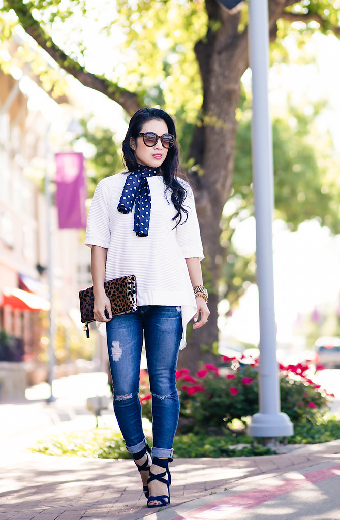 cute & little blog | petite fashion | silk neck scarf, white peplum blouse, distressed jeans, lace-up sandal heels, leopard clutch | spring outfit style trends