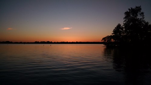 sunset sky orange lake dusk okoboji 2015 westlakeokoboji treesreflectinginwater westokoboji bayrym 2015may