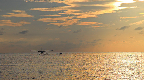 sunset south maldives tropics seaplane ari atoll