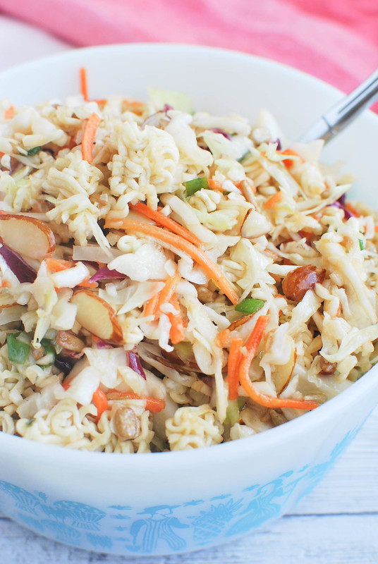 Ramen Noodle Salad - cole slaw mix, almonds, sunflower seeds, and ramen noodles in a sweet and tangy dressing. Perfect summer side dish for parties and barbecues!