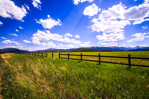 mountains farms rockies fences
