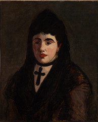 Spanish Woman Wearing a Black Cross