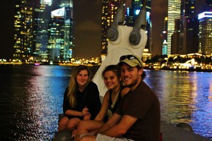 Stine, Rikke, and Tom chilling by the bay.  