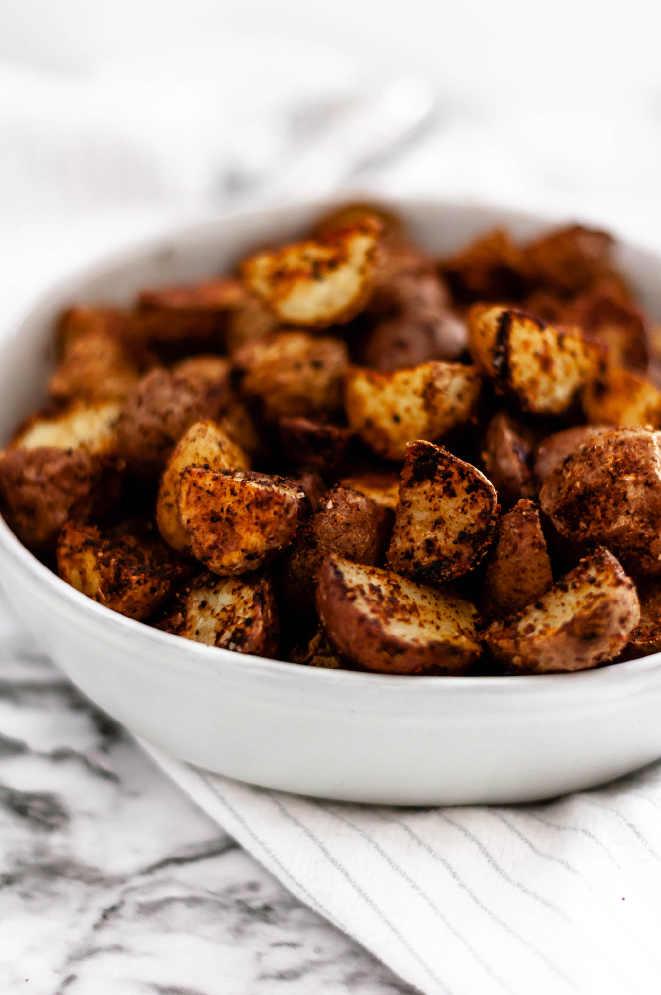 These Taco Roasted Potatoes are spiced up with your favorite taco spices. They make the perfect weeknight side dish, done in less than 30 minutes.
