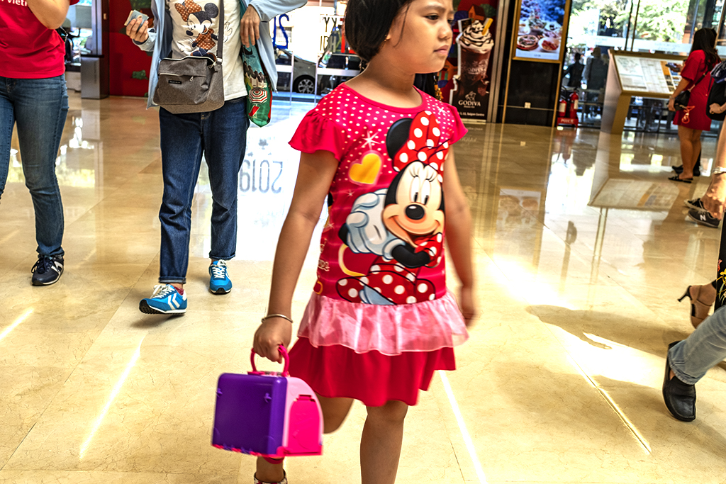 Minnie Mouse dress wearing girl inside Saigon Centre--Saigon