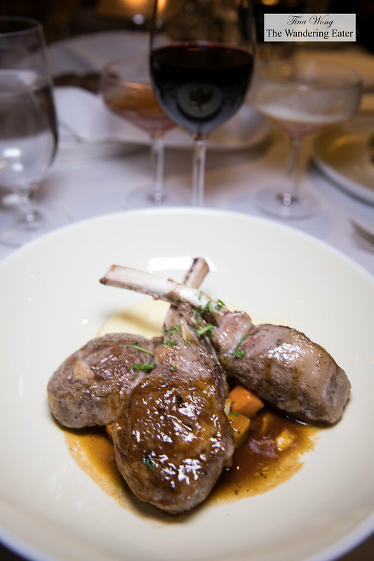 Grilled lamb chops, polenta, root vegetables, rosemary sauce with a glass of Colomé Malbec