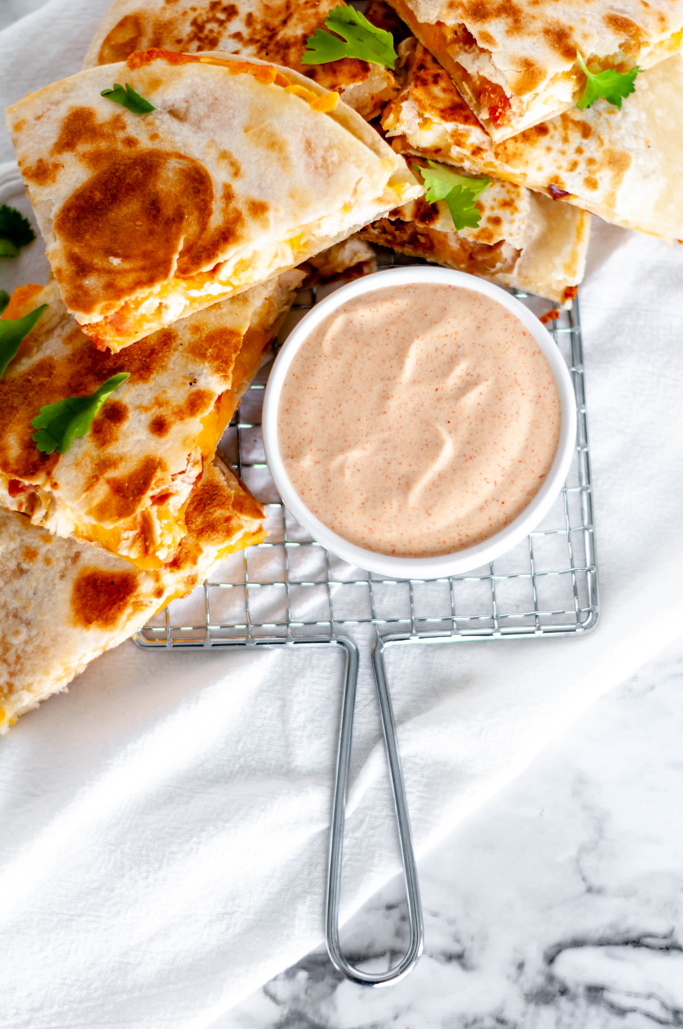 This copycat Taco Bell Quesadilla Sauce is just like the real deal and so simple to make at home. Spice up your favorite quesadilla with this yummy sauce.
