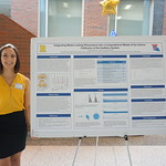 Hannah Nichols with poster