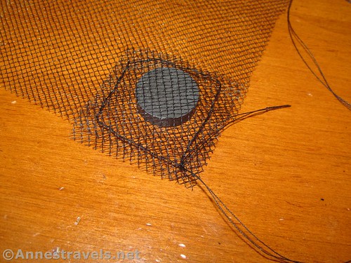 Sewing a magnet to a mosquito net screen for a Ford E150 van