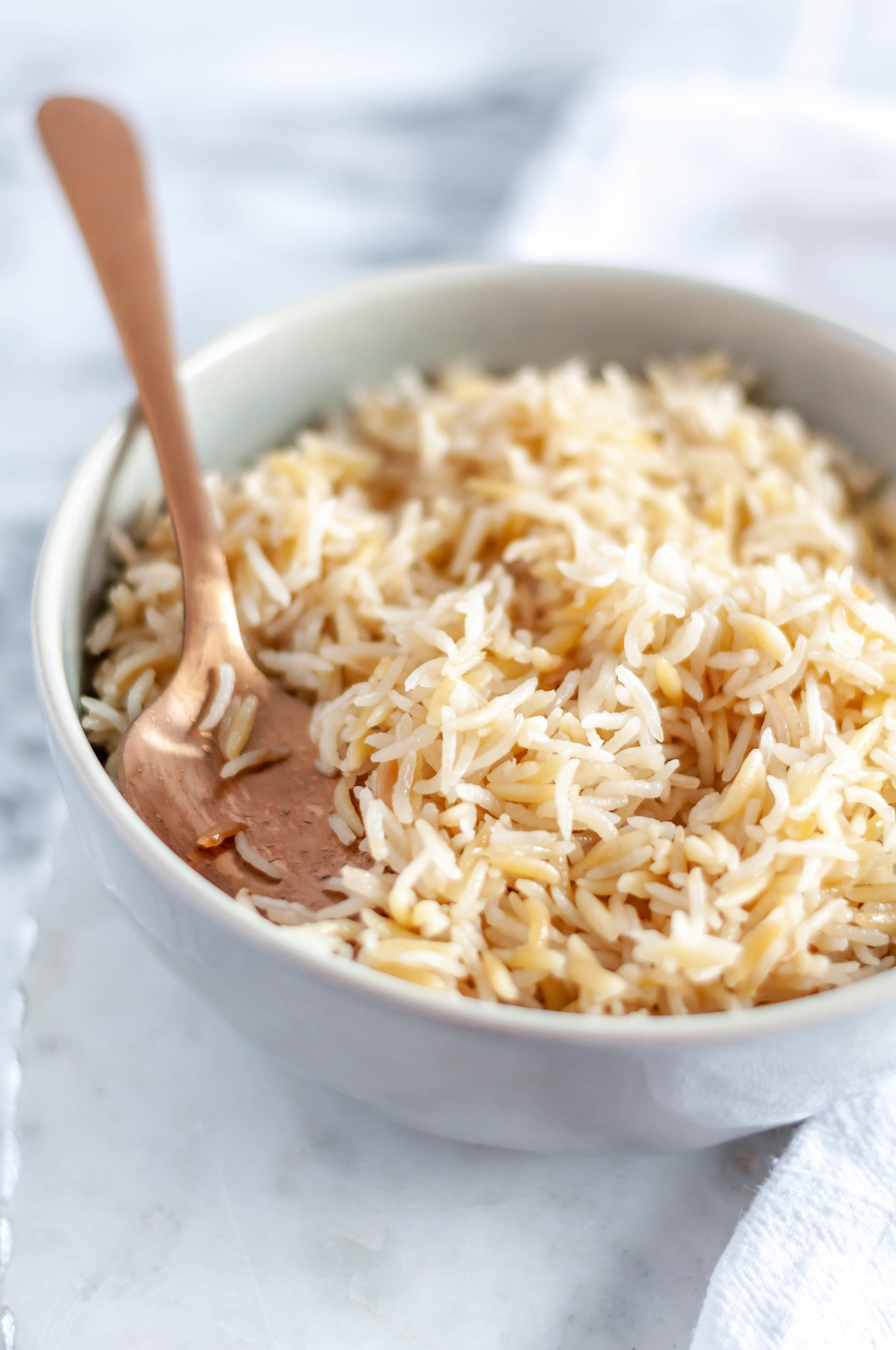 Make this Instant Pot Rice Pilaf for a super simple and flavorful side dish any night of the week. Staple pantry ingredients make up the dish and it takes less than 20 minutes to make. Perfect for a busy weeknight meal.