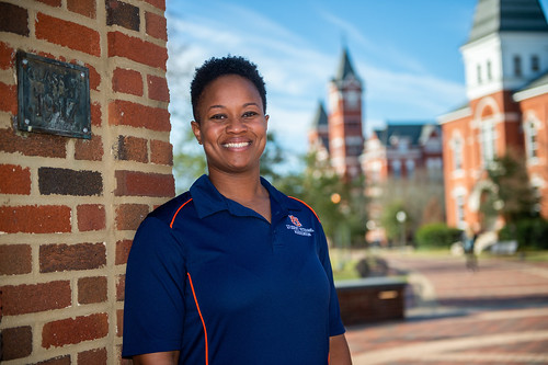 Amber Grant poses for a photo near Samford Hall