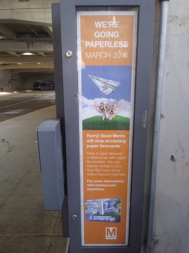 3 year old promotion about getting rid of paper transit tickets for WMATA Metrorail still up at the Silver Spring Transit Center