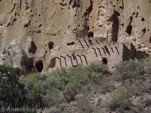 Closer zoom on the reconstructed pueblos at the base of the cliff on the Main Loop at Bandelier National Monument, New Mexico