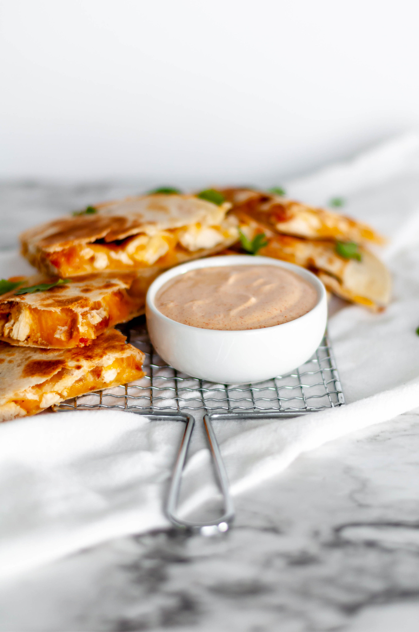 This copycat Taco Bell Quesadilla Sauce is just like the real deal and so simple to make at home. Spice up your favorite quesadilla with this yummy sauce.