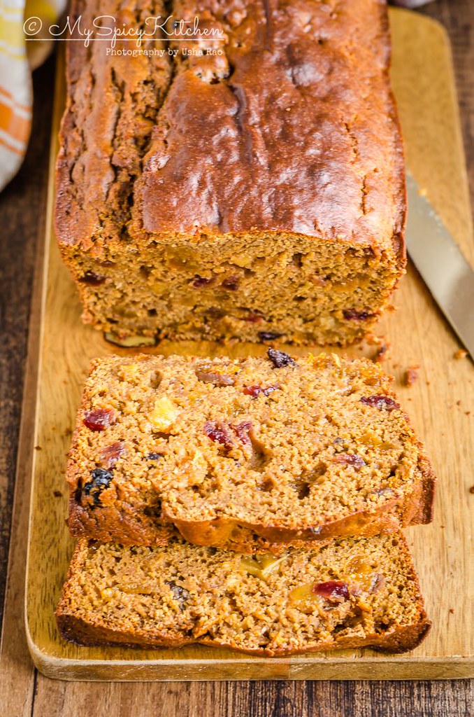 Sliced loaf of classic non alcoholic healthy fruit cake