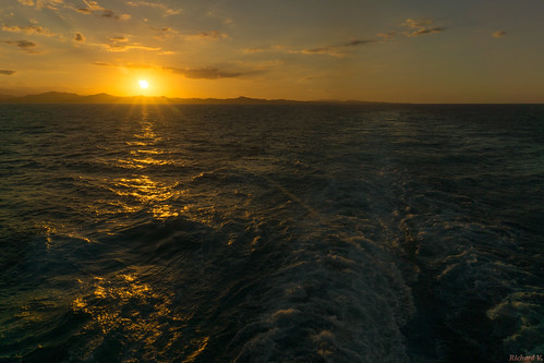 sunsetcoucherdesoleil ambercove republiquedominicaine 8931 beauté du soleil au coucher derrière le sillage dun bateau