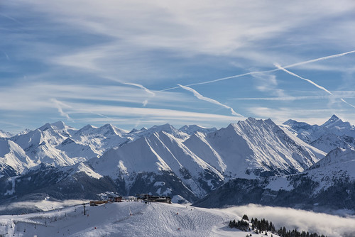 world top hill mountain mountains alps austria salzburg mittersill wildkogel europe view nature snow winter clouds sky ski skiing sun cablecar outdoors landscape