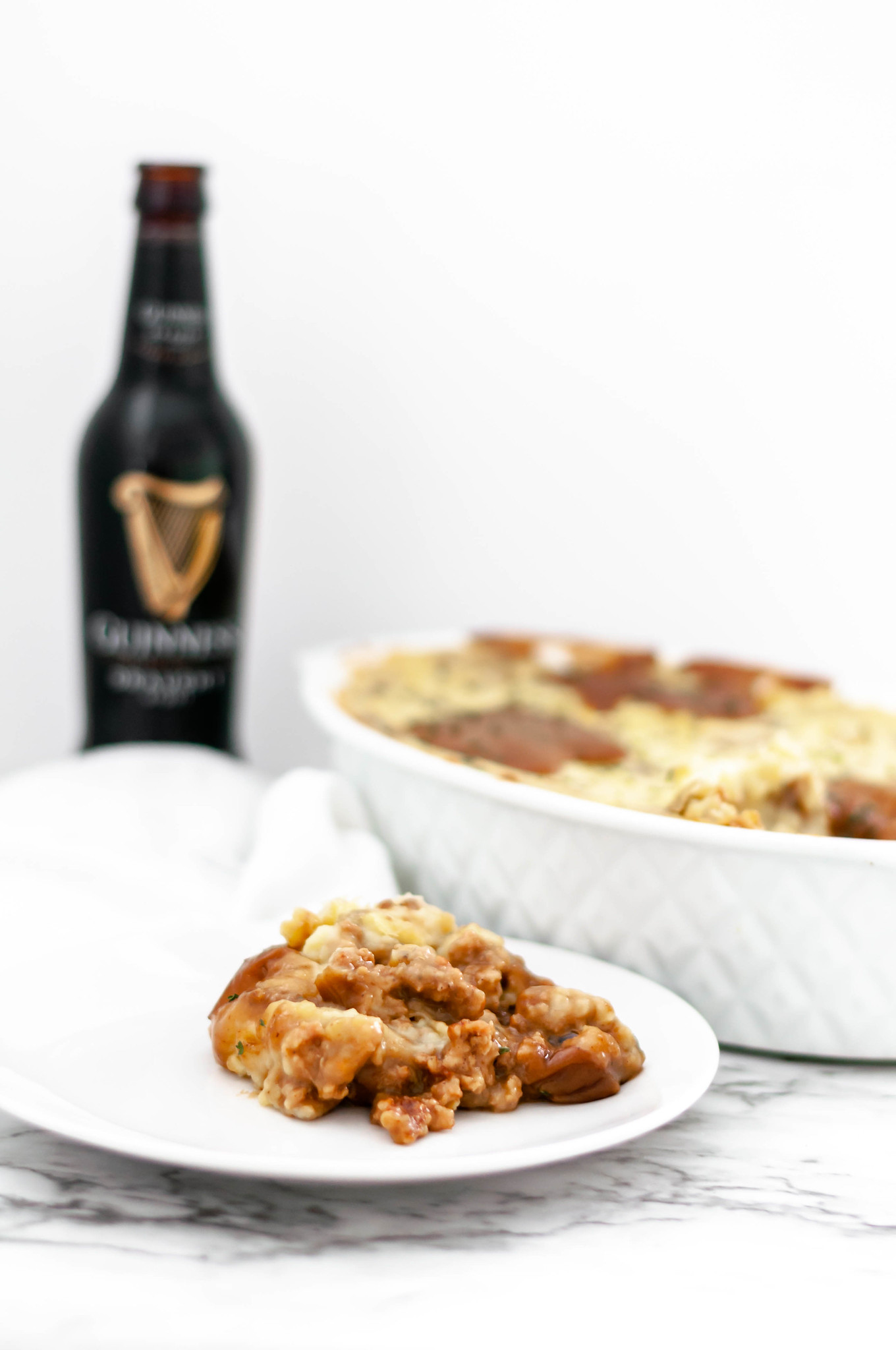 This rich and hearty Bangers and Mash Casserole would be perfect for St. Patrick's Day. All the classic flavors and ingredients of Bangers and Mash combined into a hearty casserole.