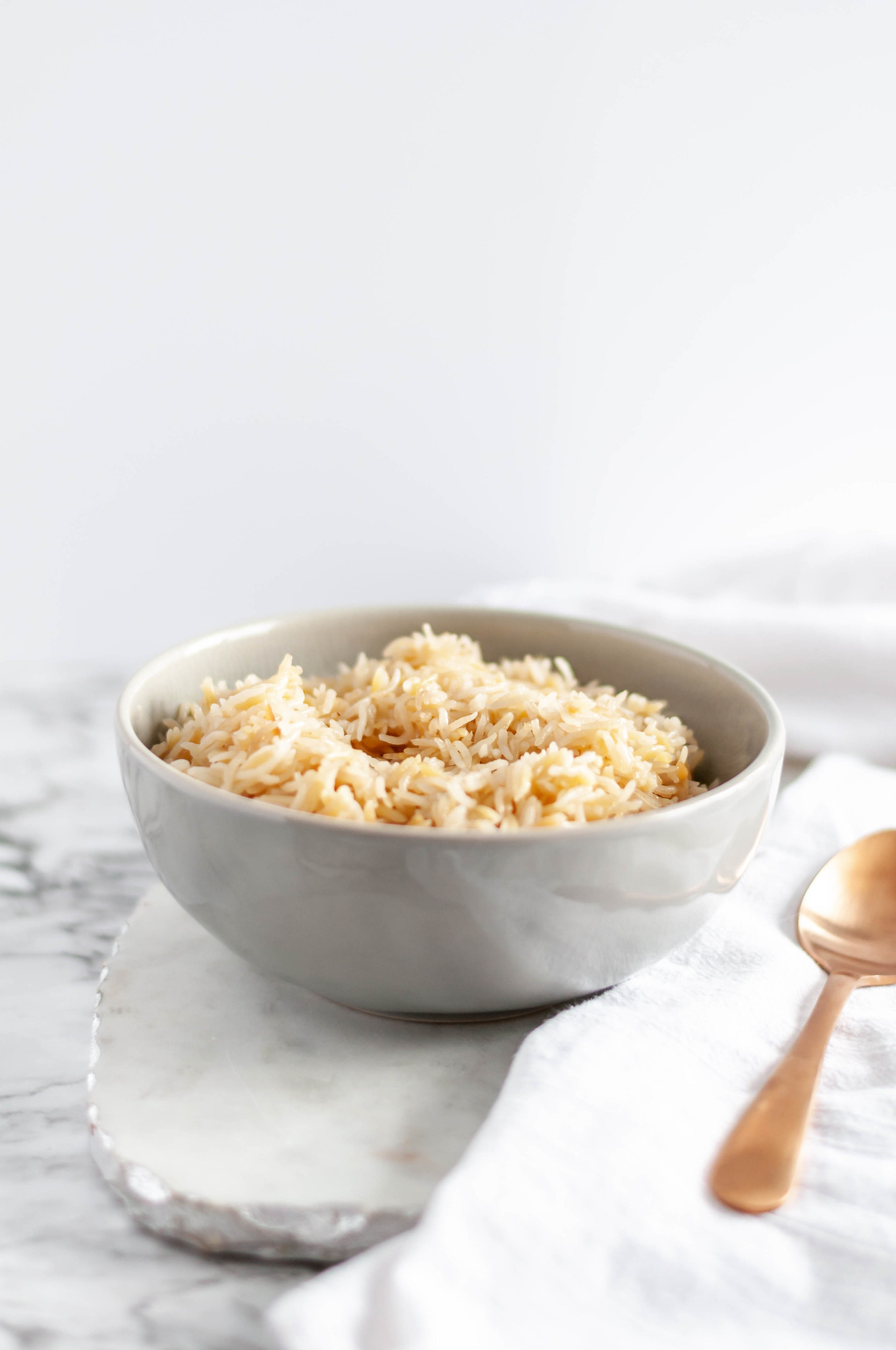 Make this Instant Pot Rice Pilaf for a super simple and flavorful side dish any night of the week. Staple pantry ingredients make up the dish and it takes less than 20 minutes to make. Perfect for a busy weeknight meal.
