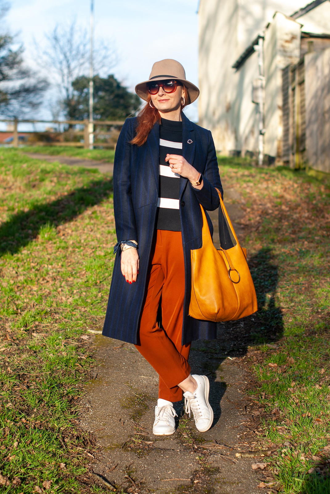 Styling Workwear (Pinstripes) and Sportswear (Adidas) Together (long pinstripe navy coat, Breton stripe sweater, pumpkin trousers, Stan Smiths) | Not Dressed As Lamb, fashion over 40