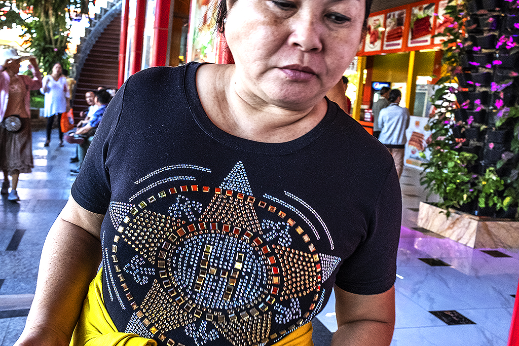 Woman with large star on black T-shirt--Soc Trang