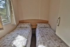 One of the twin rooms