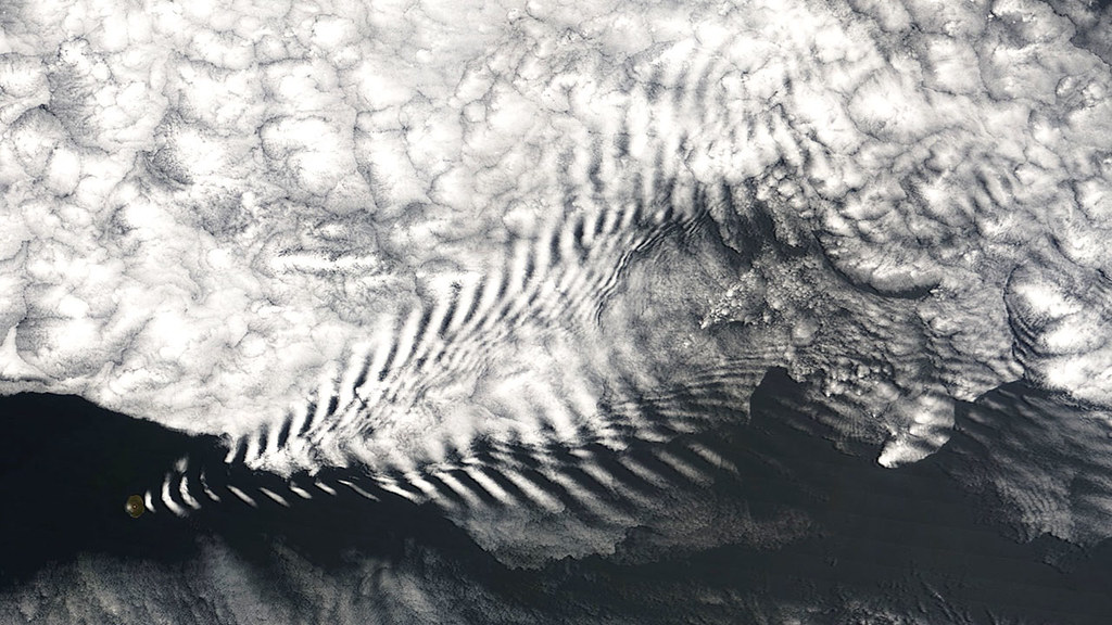 NASA satellite image of a wave cloud forming off of Amsterdam Island in the far southern Indian Ocean.