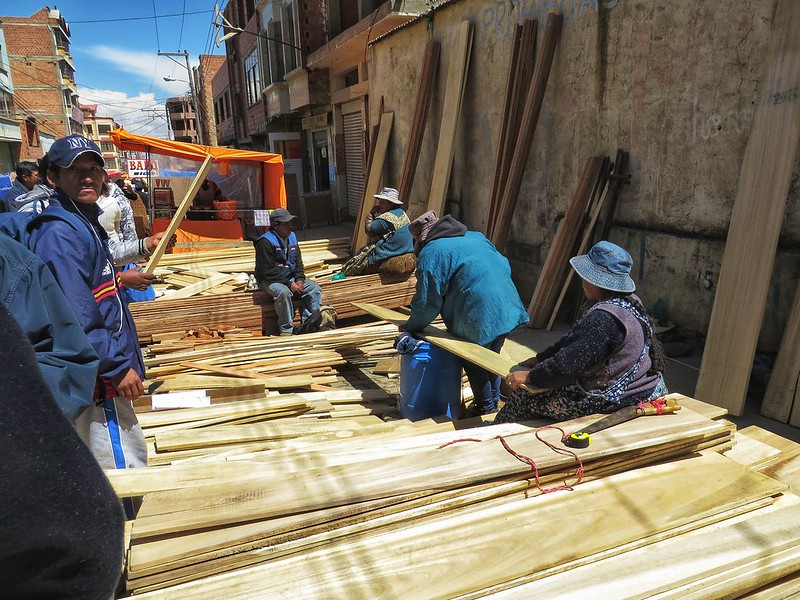 Planks of wood for sale at El Alto market, Bolivia