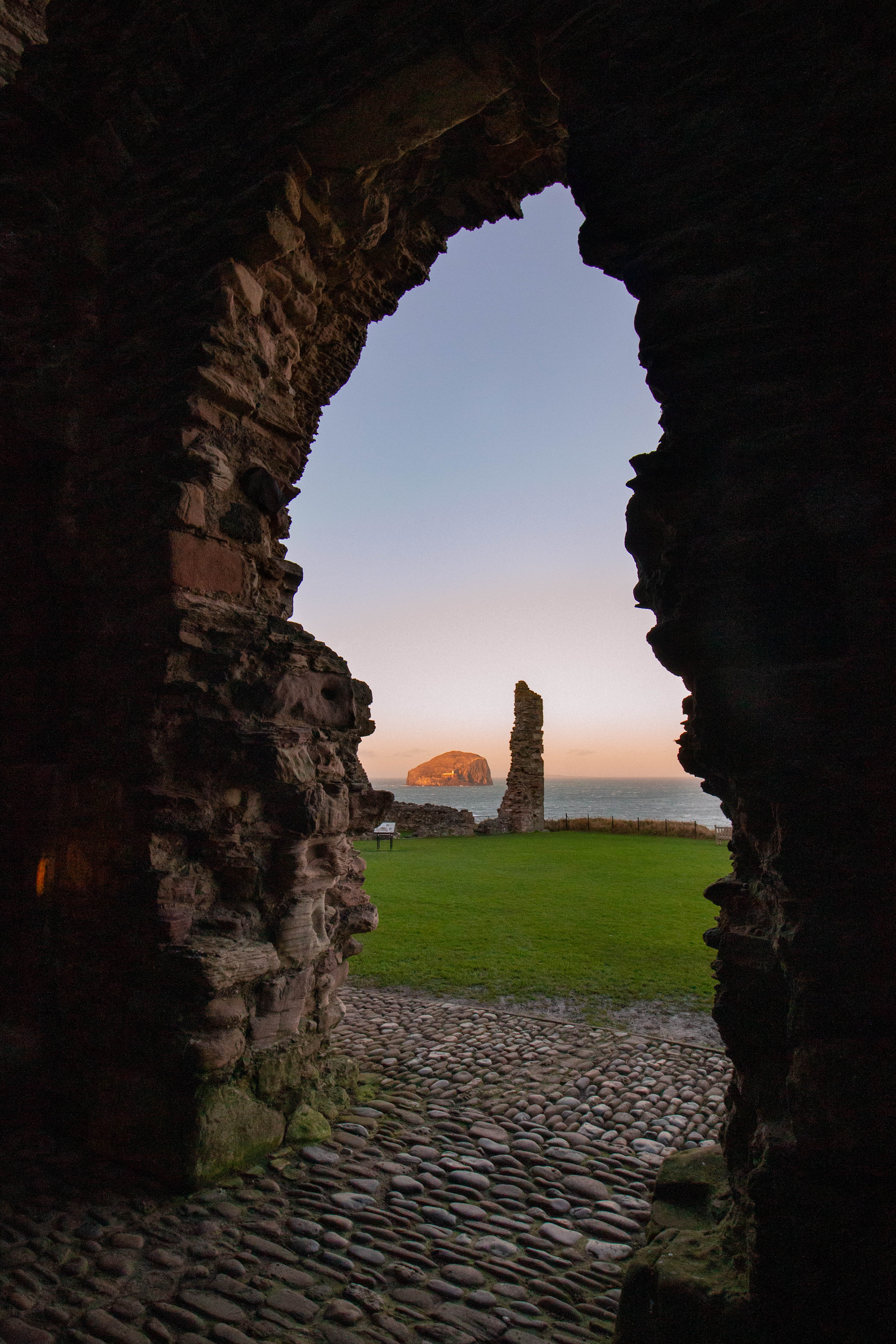 Bass Rock seen through the doorway of Tantallon Castle