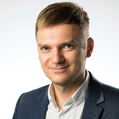 Portrait photograph of Dr Lukasz Piwek