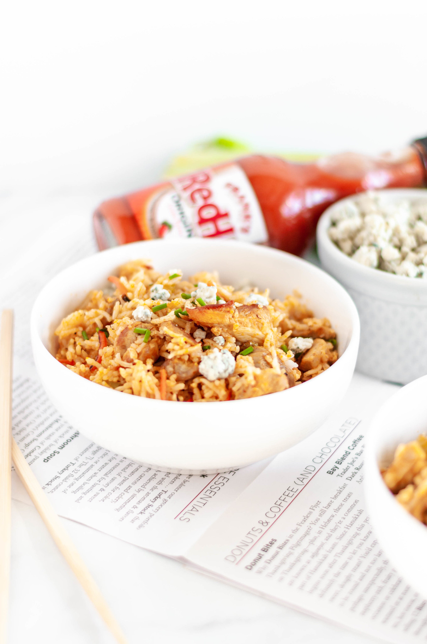 Buffalo Fried Rice is a super simple, flavorful and spicy dinner you can whip up in less than 30 minutes with some leftover rice. Spicy buffalo chicken, carrots, celery and buffalo sauce with a sprinkle of crumbled blue cheese.