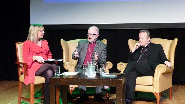 Sarah Clarke with Archbishops Richard Clarke and Eamon Martin at the 2019 St Patrick's Lecture, in the Market Place Theatre, Armagh.