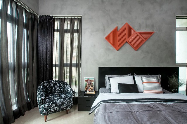 A neutral warm undertone modern bedroom in slate grey