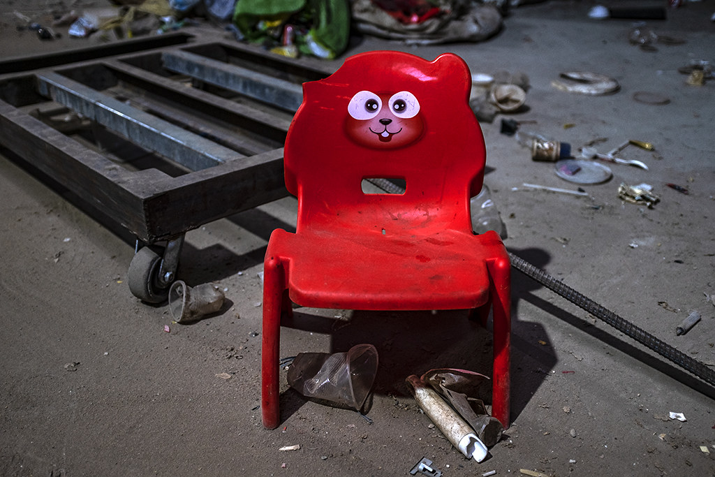 Red chair with cartoon face--Ea Kly