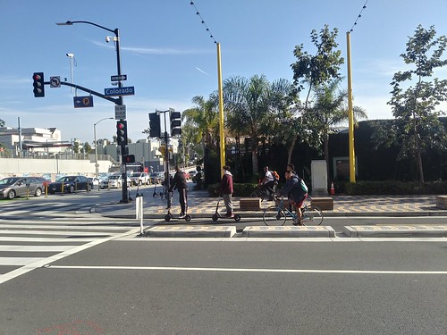 Bicyclists and scooter riders in Santa Monica on Colorado Avenue