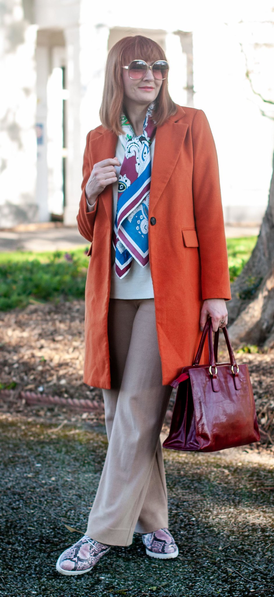 Fashion Over 40: A Longline Coat or Blazer is Your Wardrobe's Best Friend \ longline orange coat \ camel wide leg trousers \ red leather tote bag \ pink snakeskin lace up shoes | Not Dressed As Lamb